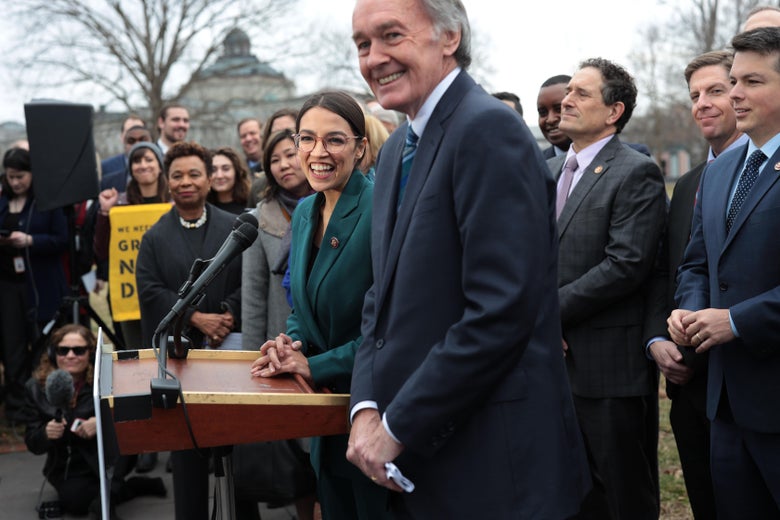 WASHINGTON, DC - FEBRUARY 07: U.S. Rep. Alexandria Ocasio-Cortez (D-NY), Sen. Ed Markey (D-MA) and other Congressional Democrats listen during a news conference in front of the U.S. Capitol February 7, 2019 in Washington, DC. Sen. Markey and Rep. Ocasio-Cortez held a news conference to unveil their Green New Deal resolution. (Photo by Alex Wong/Getty Images)